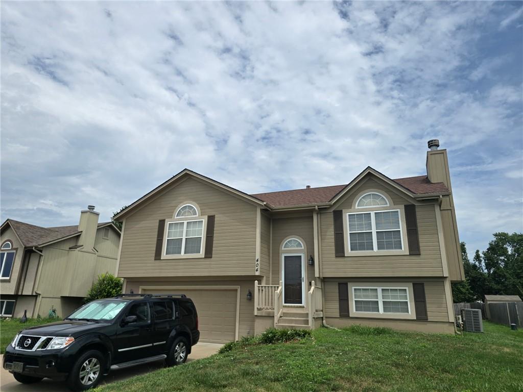 Photo of 404 Blue Grass Drive in Raymore, MO